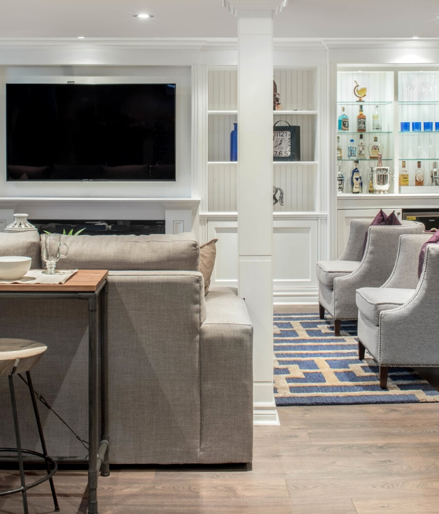 transitional basement living room with built-ins | Design by Catherine-Lucie Horber